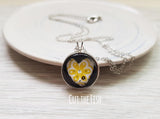 yellow black heart necklace