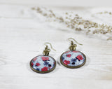 blue earrings with red flowers